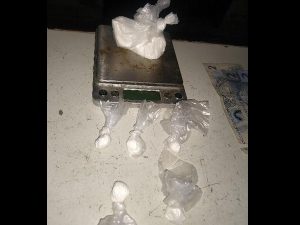 Dinheiro, droga, arma e munições apreendido em Blumenau
