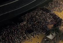 Fé antes do amanhecer: multidão lota a Praia Central de Itapema para acompanhar a novena de Frei Gilson