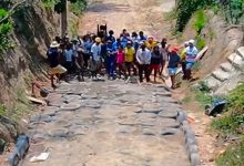 De lixo a estrada: comunidade transforma pneus descartados em rua ecológica e muda a própria realidade