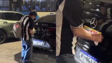 Homem cola adesivos de Lula em carros sem autorização e acaba tendo que retirar em SC